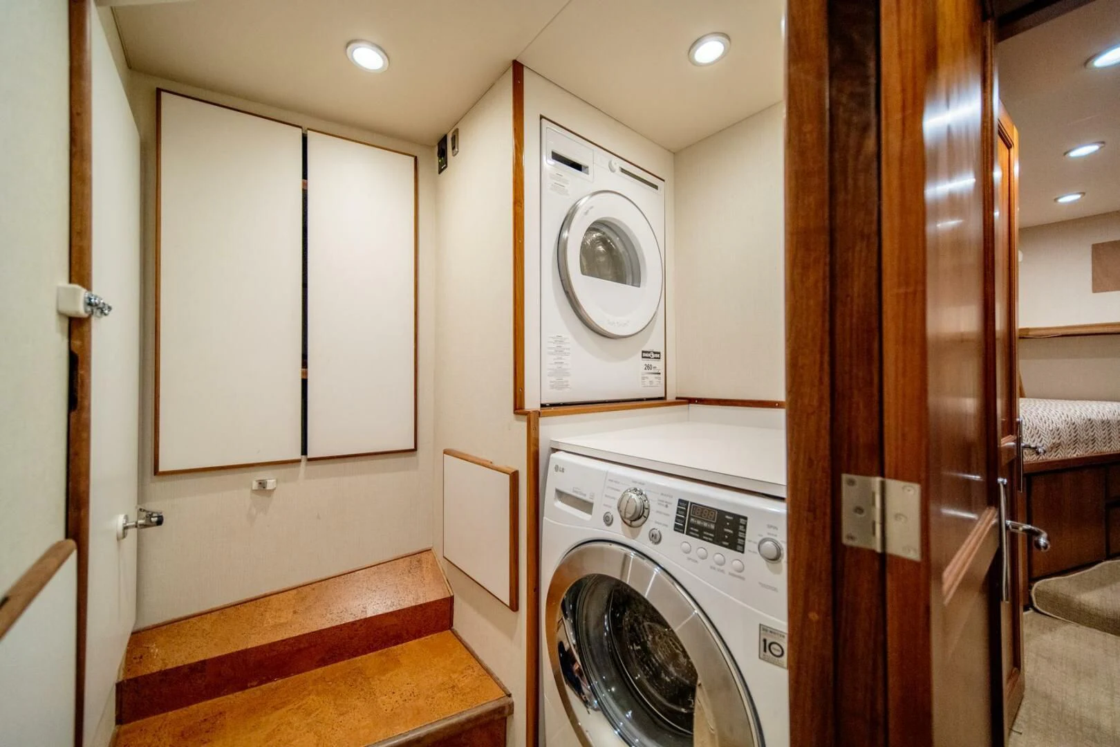a washer and dryer in a bathroom aboard SEA LION Yacht for Sale