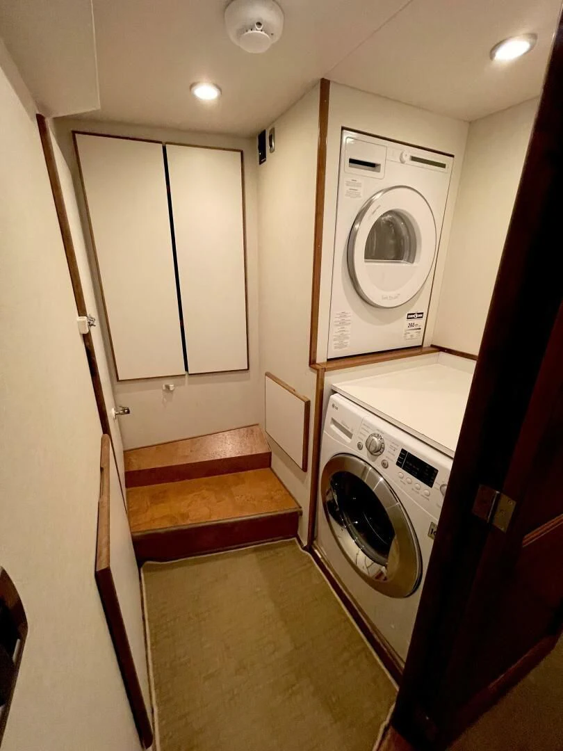 a washer and dryer in a laundry room aboard SEA LION Yacht for Sale