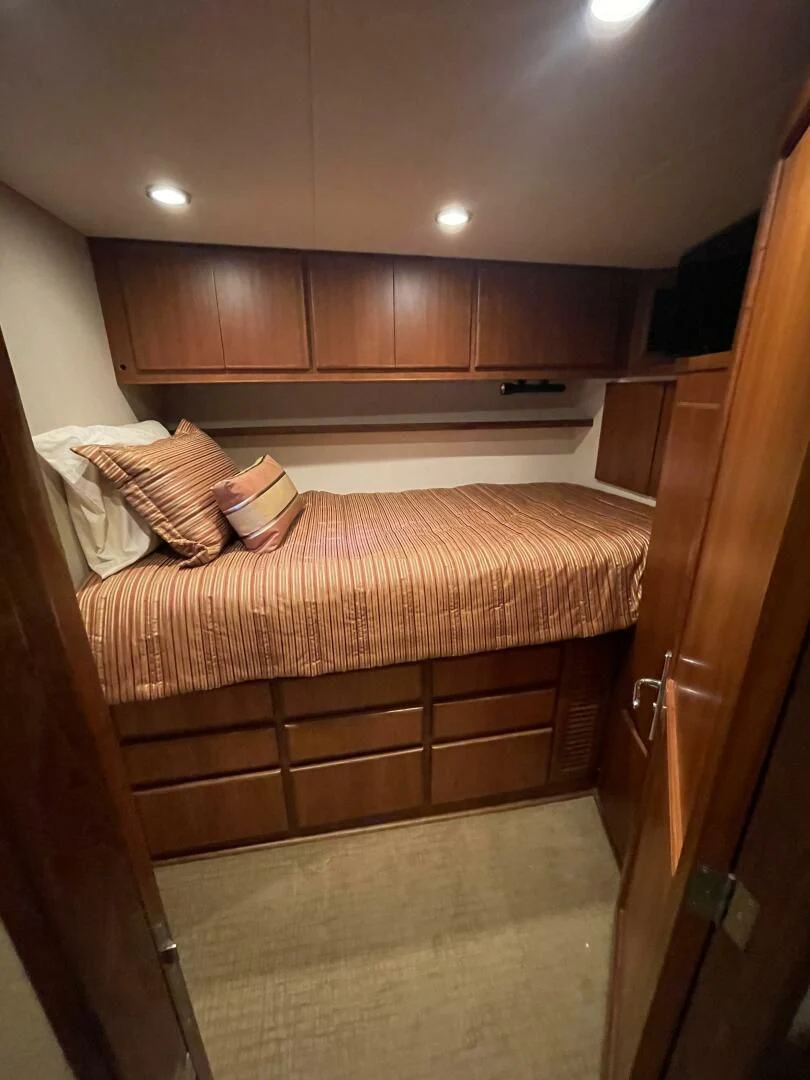 a bed in a room aboard SEA LION Yacht for Sale
