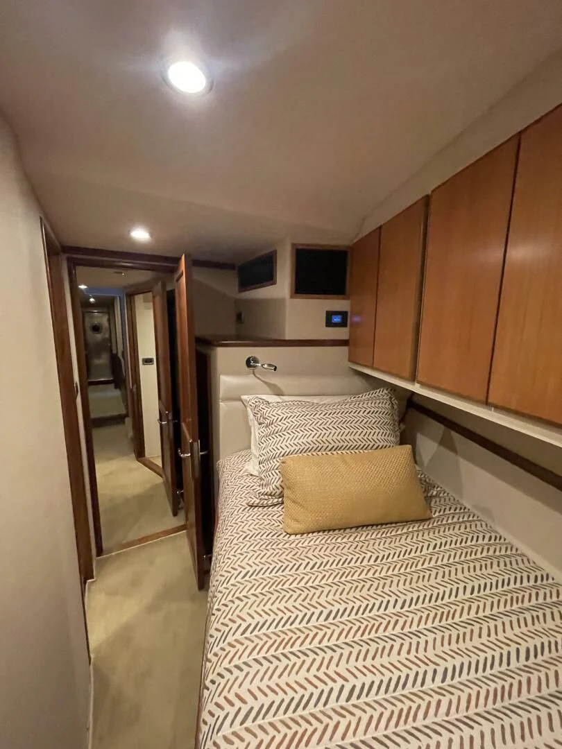 a bed in a room aboard SEA LION Yacht for Sale