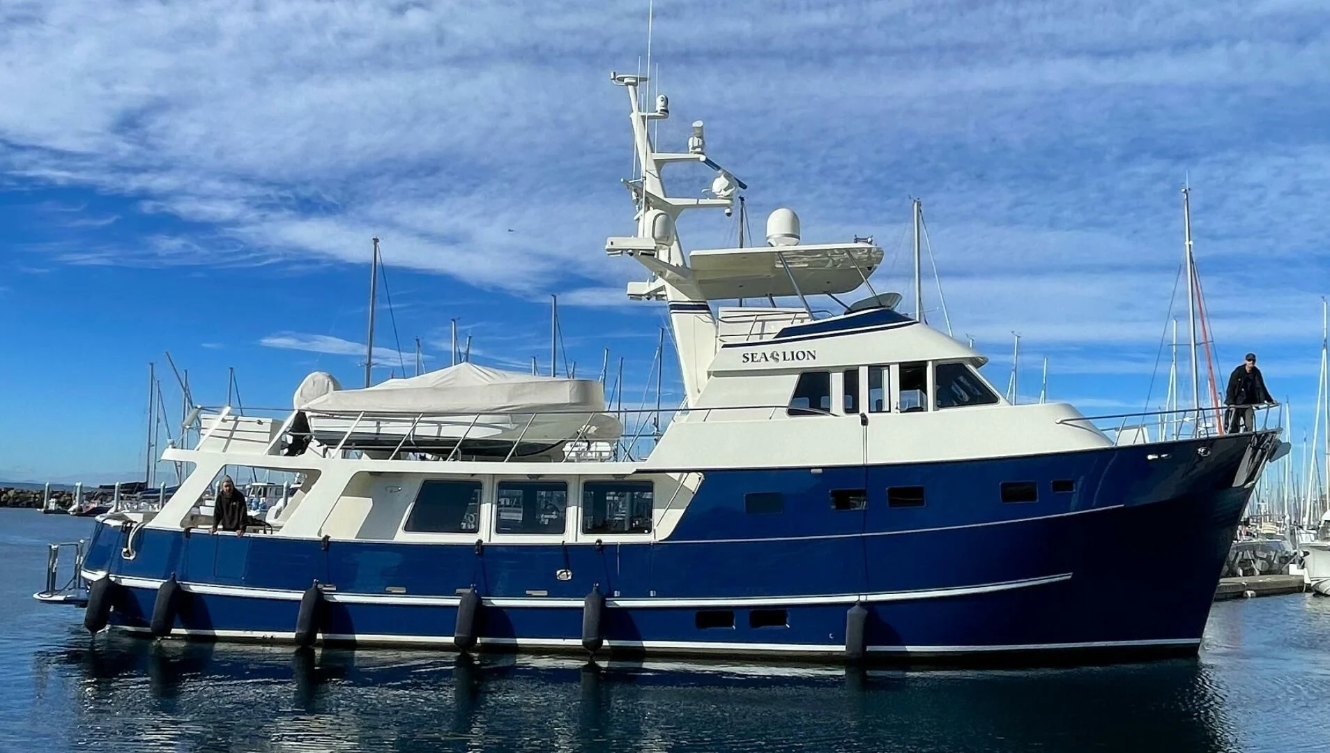 a large boat in the water aboard SEA LION Yacht for Sale