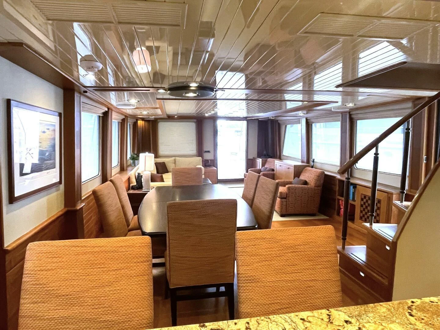 a living room with a large window aboard SEA LION Yacht for Sale
