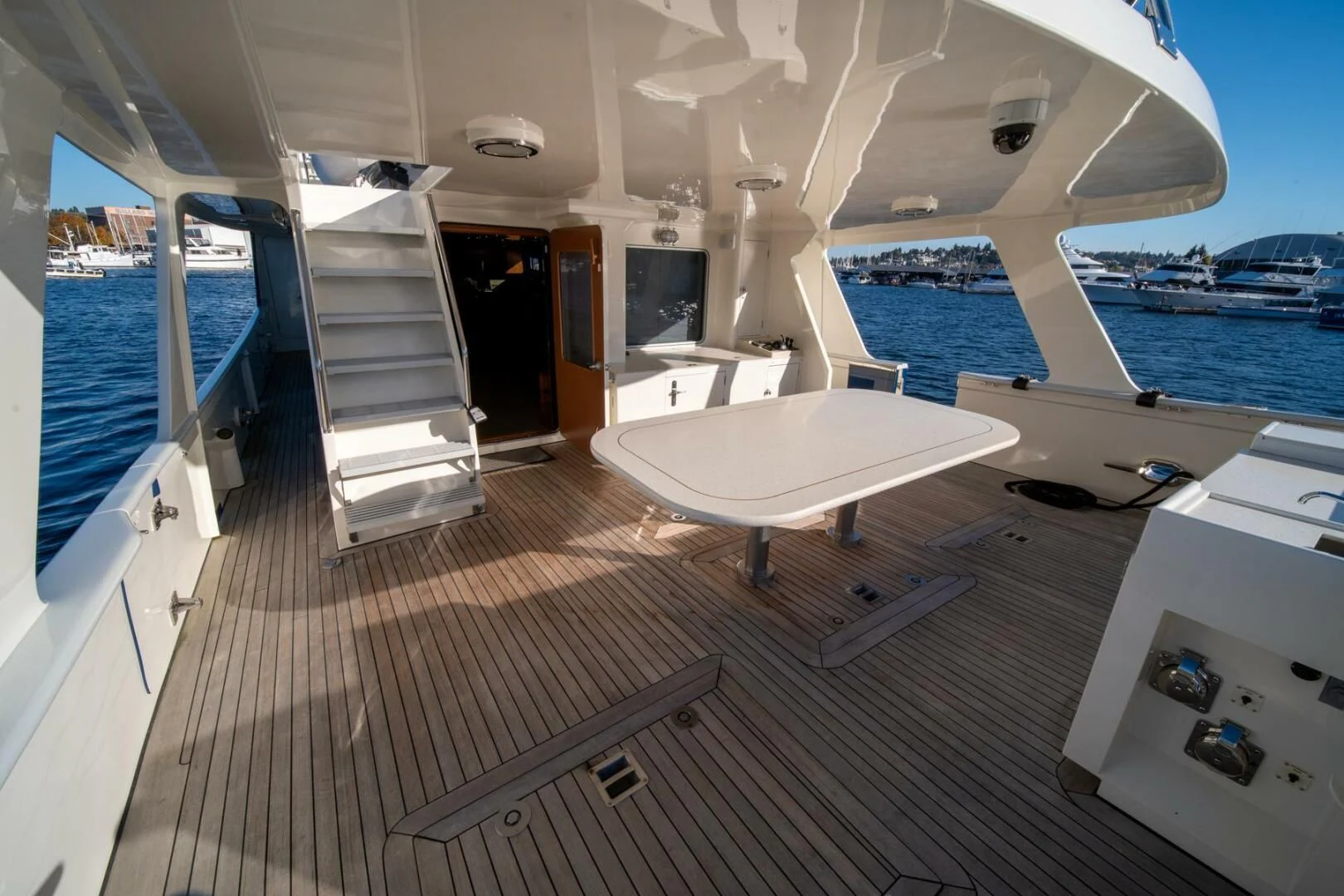 a room with a table and chairs aboard SEA LION Yacht for Sale