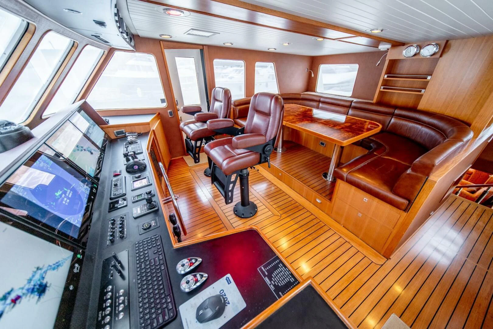 a room with a couch and a table aboard SEA LION Yacht for Sale