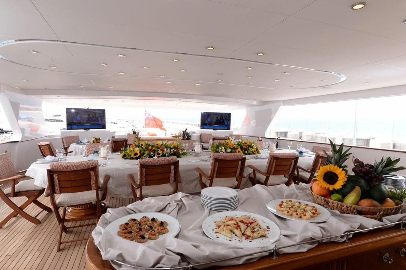 a table with food on it aboard SUITE Yacht for Sale
