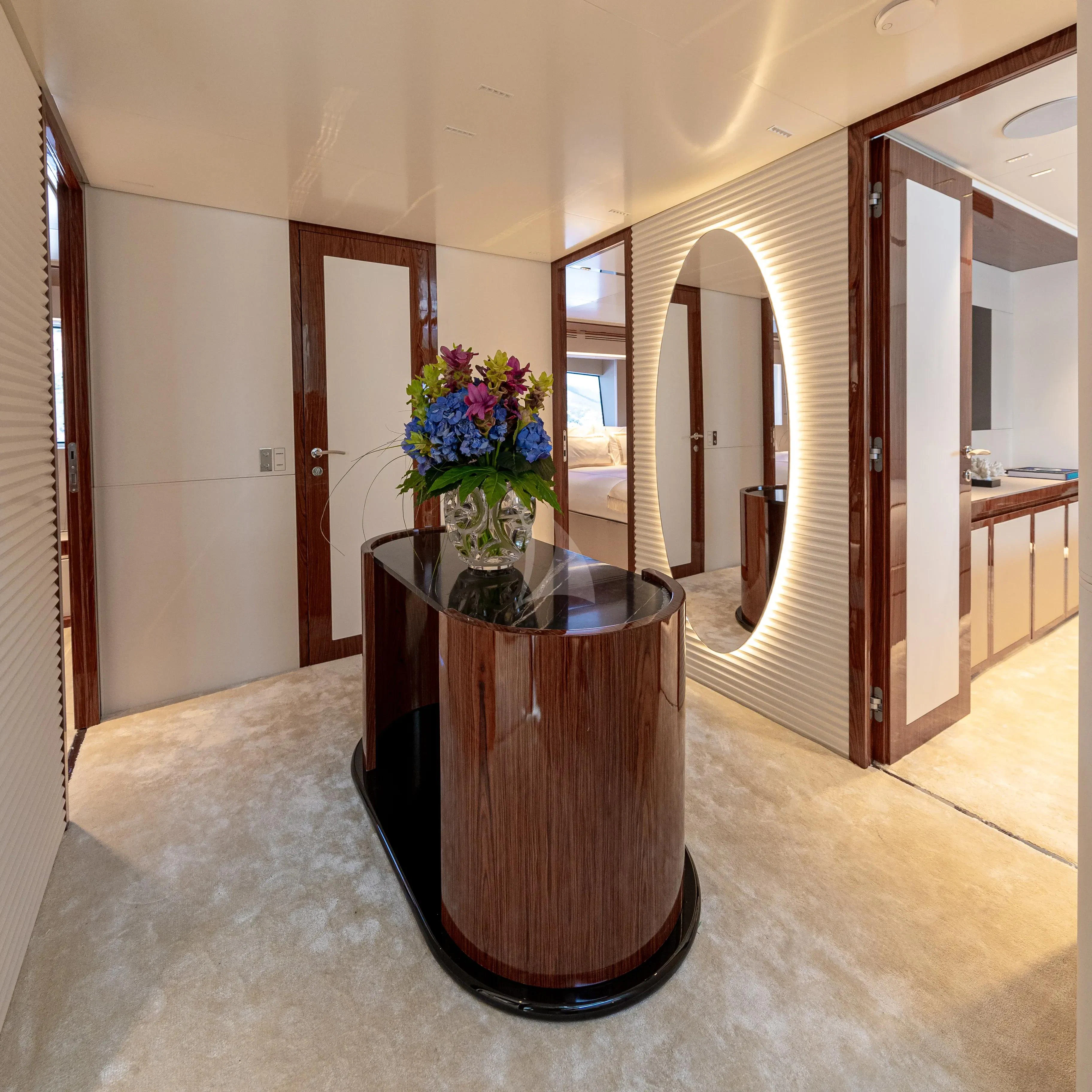 a vase of flowers on a table aboard LAFAYETTE Yacht for Sale