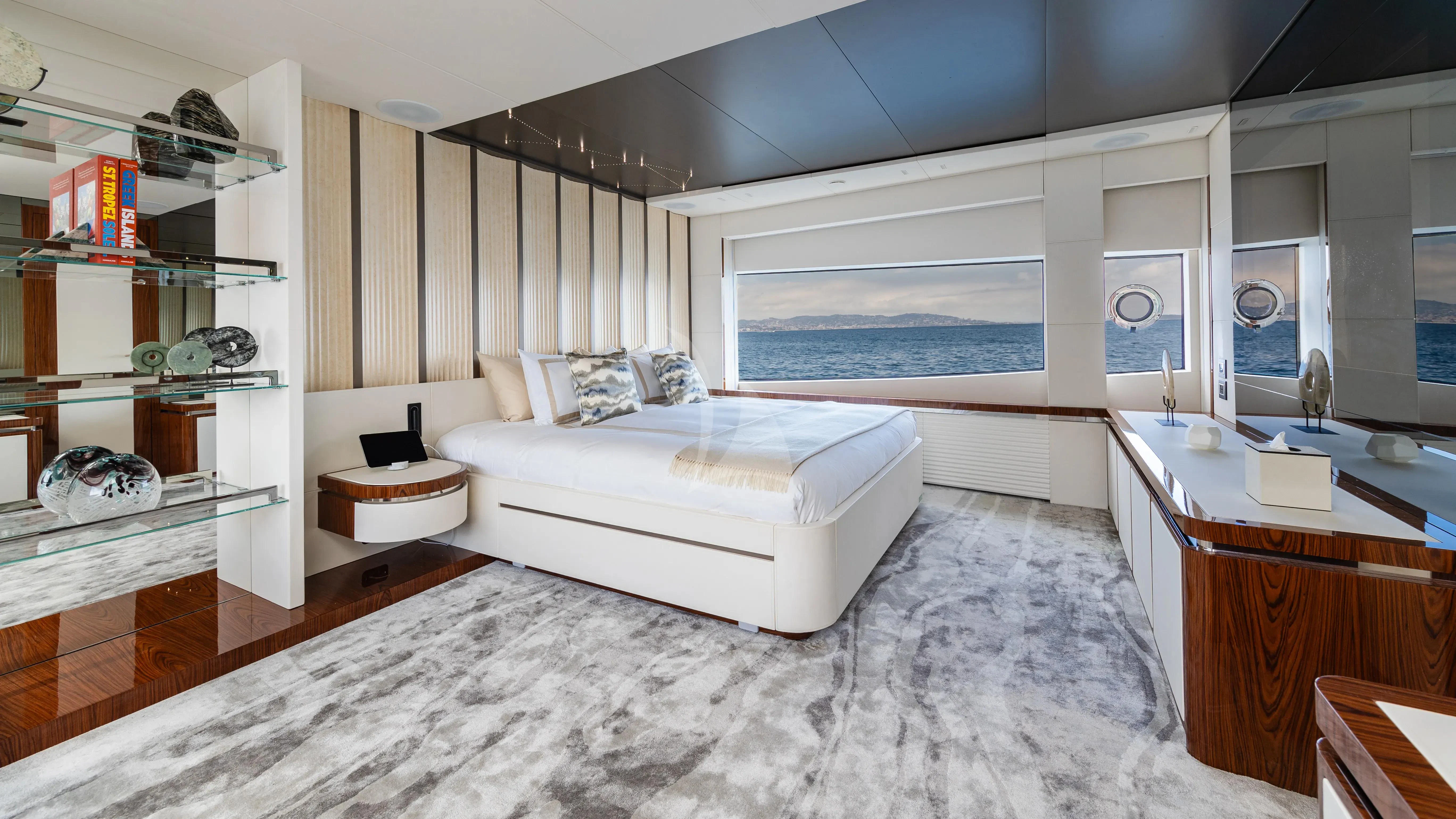 a room with a bed and a desk aboard LAFAYETTE Yacht for Sale