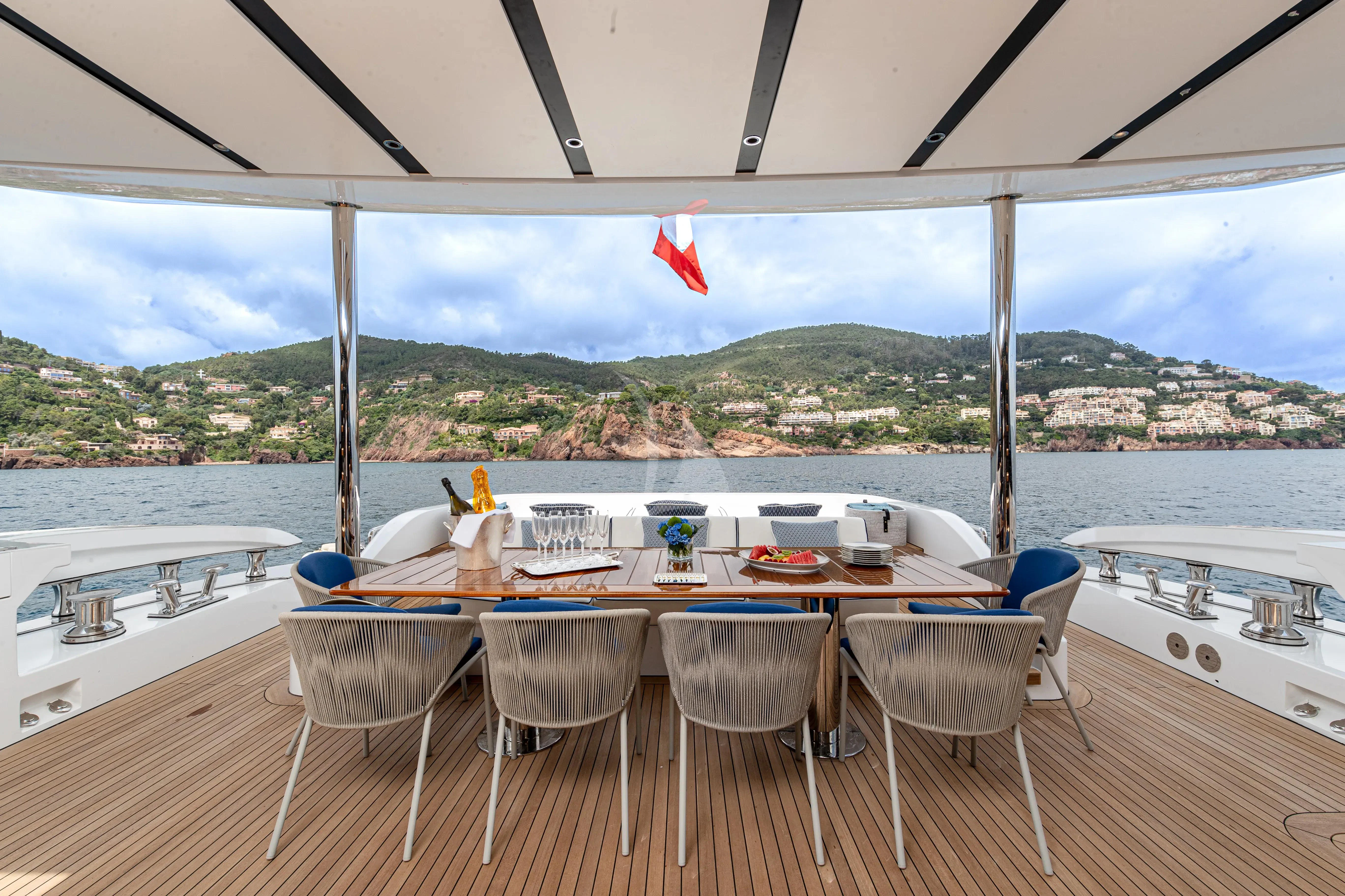 a table set for a meal on a boat aboard LAFAYETTE Yacht for Sale