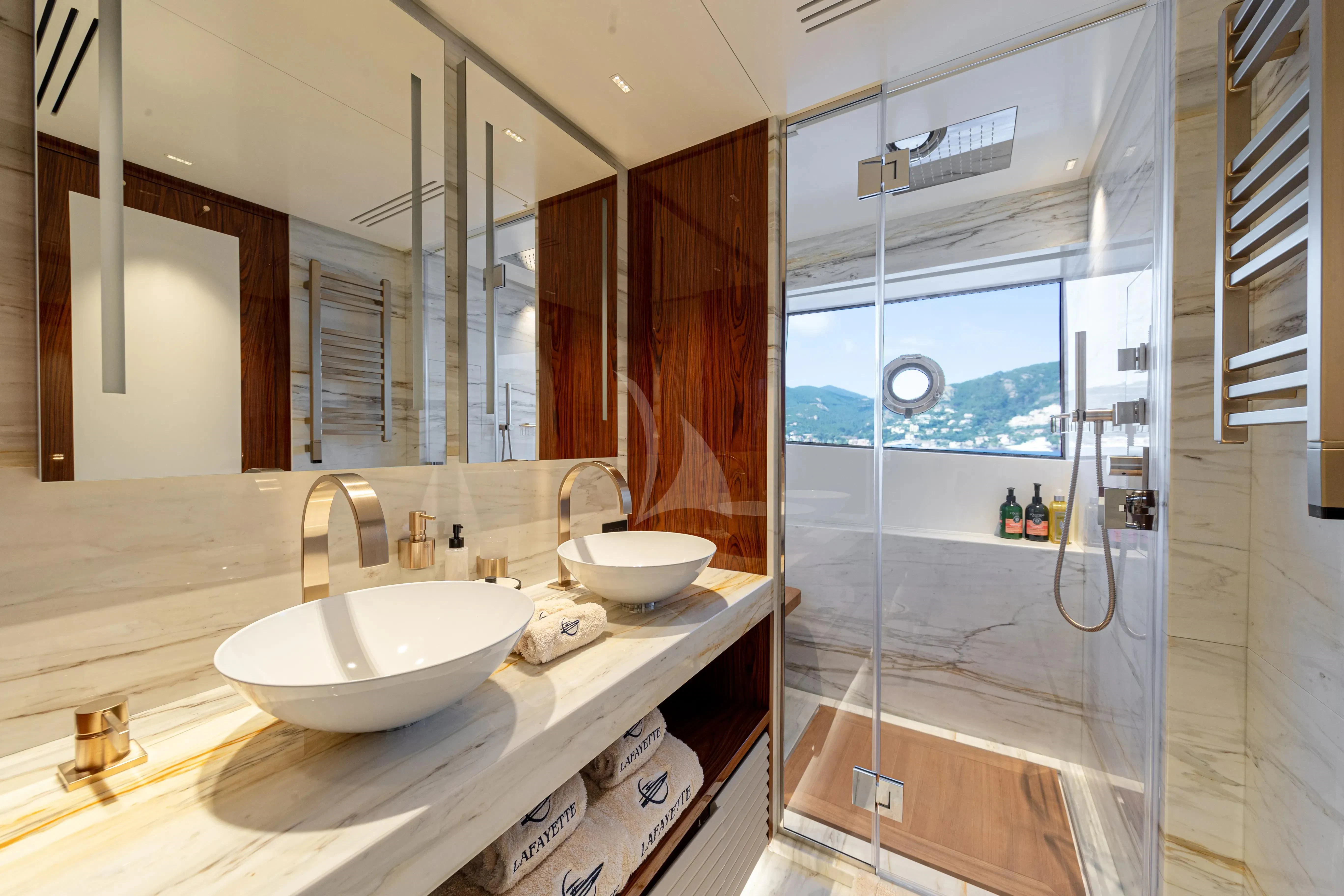 a bathroom with a sink and a shower aboard LAFAYETTE Yacht for Sale
