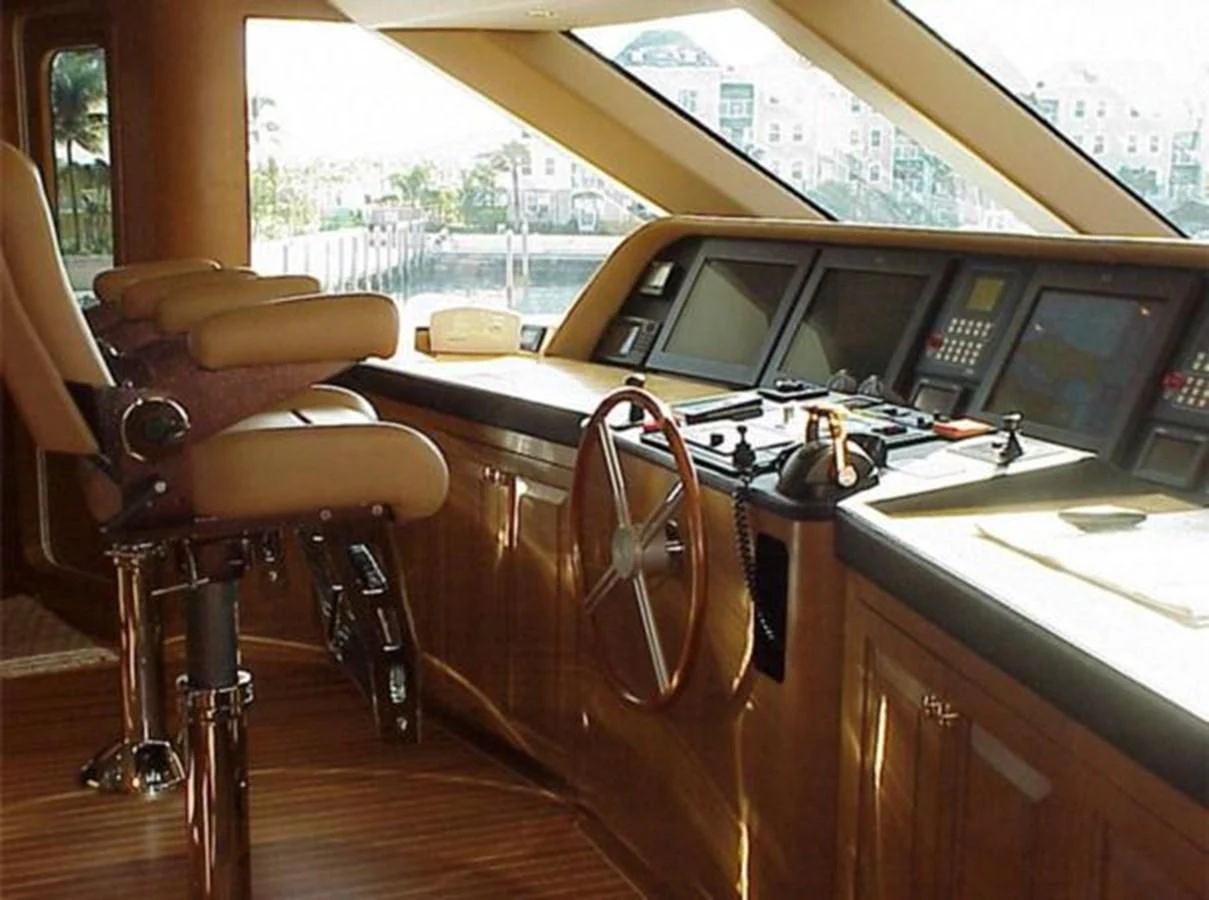 a car with a seat and steering wheel aboard MYC Yacht for Sale