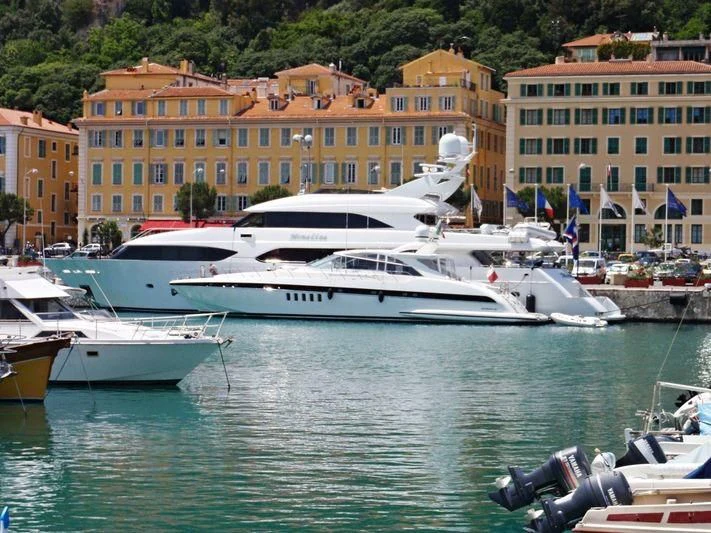 several boats in a harbor aboard MYC Yacht for Sale