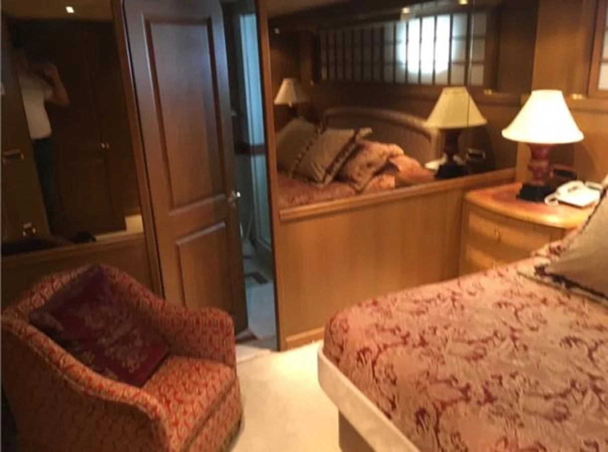 a room with two beds aboard MYC Yacht for Sale