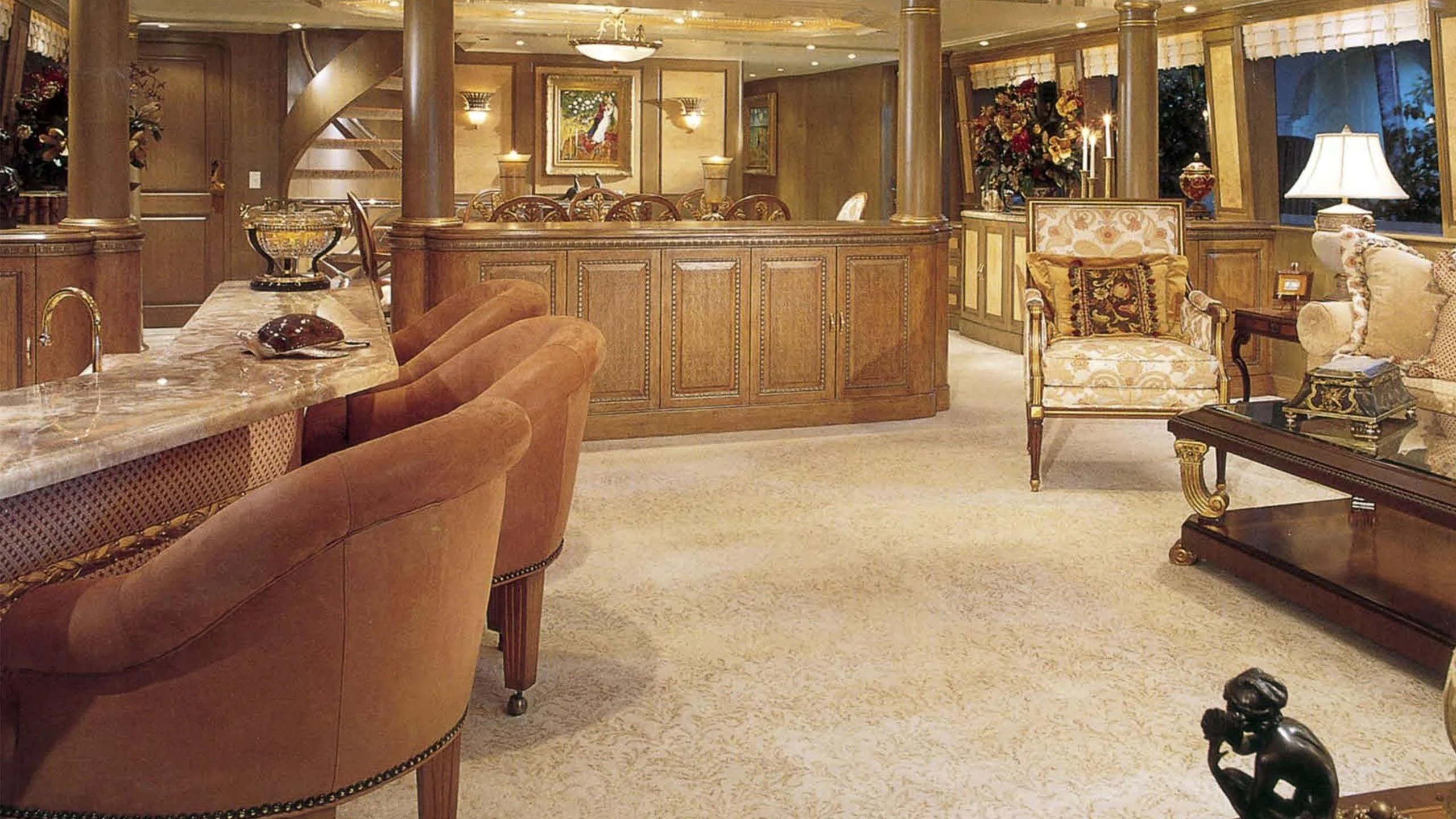 a living room with a large mirror aboard MYC Yacht for Sale