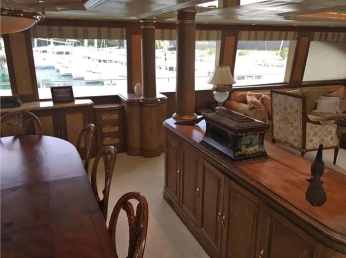 a room with a piano and a piano aboard MYC Yacht for Sale