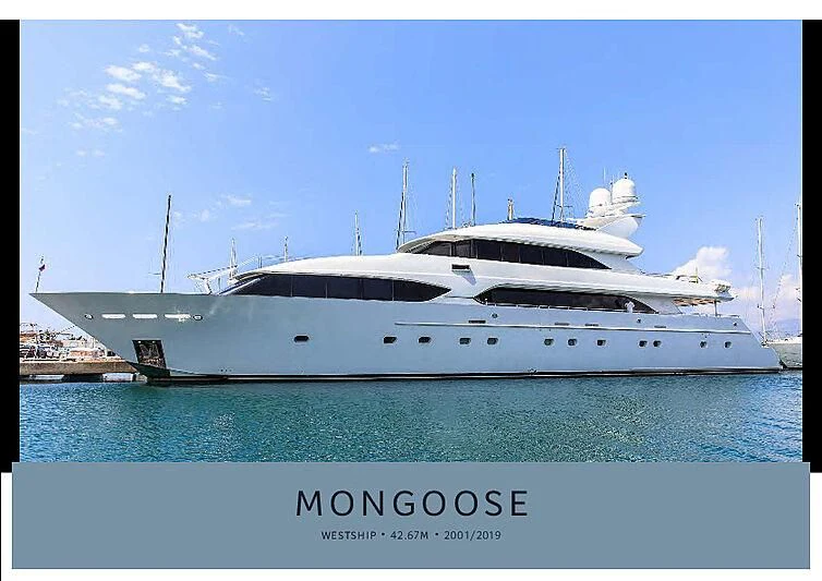 a white yacht in the water aboard MYC Yacht for Sale