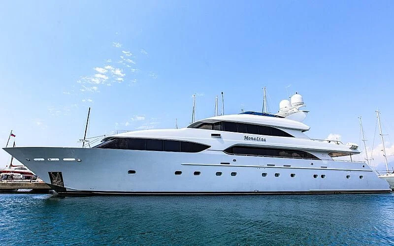 a white yacht in the water aboard MYC Yacht for Sale