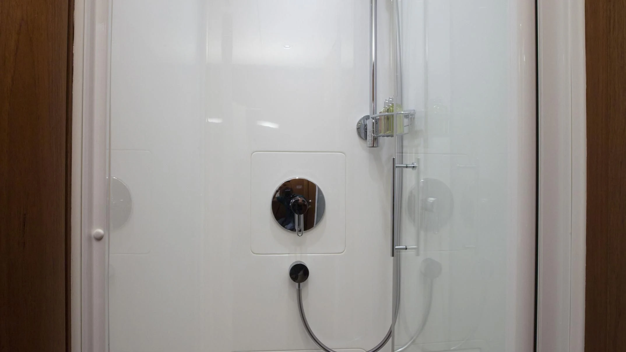 a white door with a handle aboard ELYSIUM Yacht for Sale