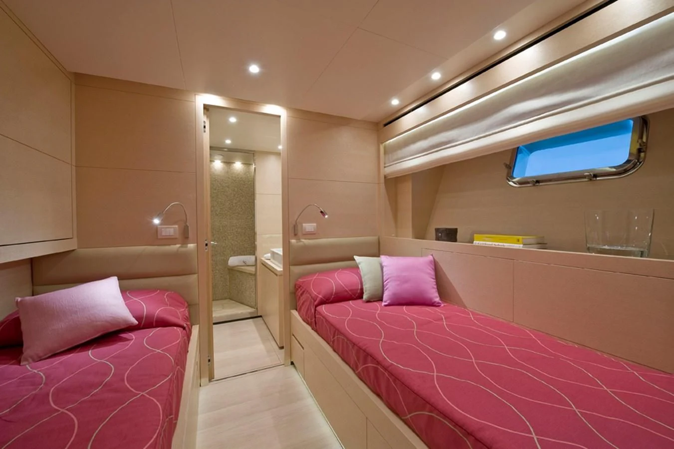 a room with a bed and a mirror aboard ELYSIUM Yacht for Sale