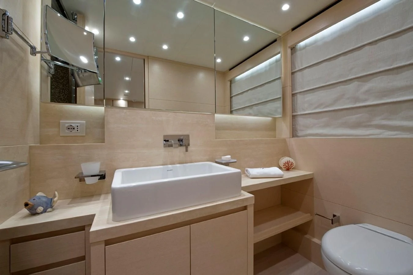 a bathroom with a sink and toilet aboard ELYSIUM Yacht for Sale