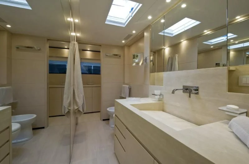 a bathroom with a large shower curtain aboard ELYSIUM Yacht for Sale
