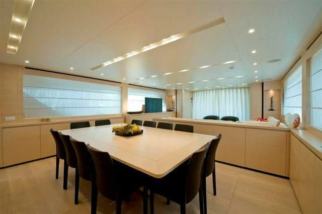 a large kitchen with white cabinets aboard ELYSIUM Yacht for Sale