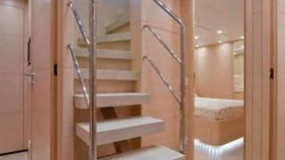 a set of stairs in a room aboard ELYSIUM Yacht for Sale