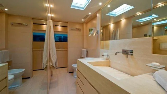 a bathroom with a large sink and a bathtub aboard ELYSIUM Yacht for Sale