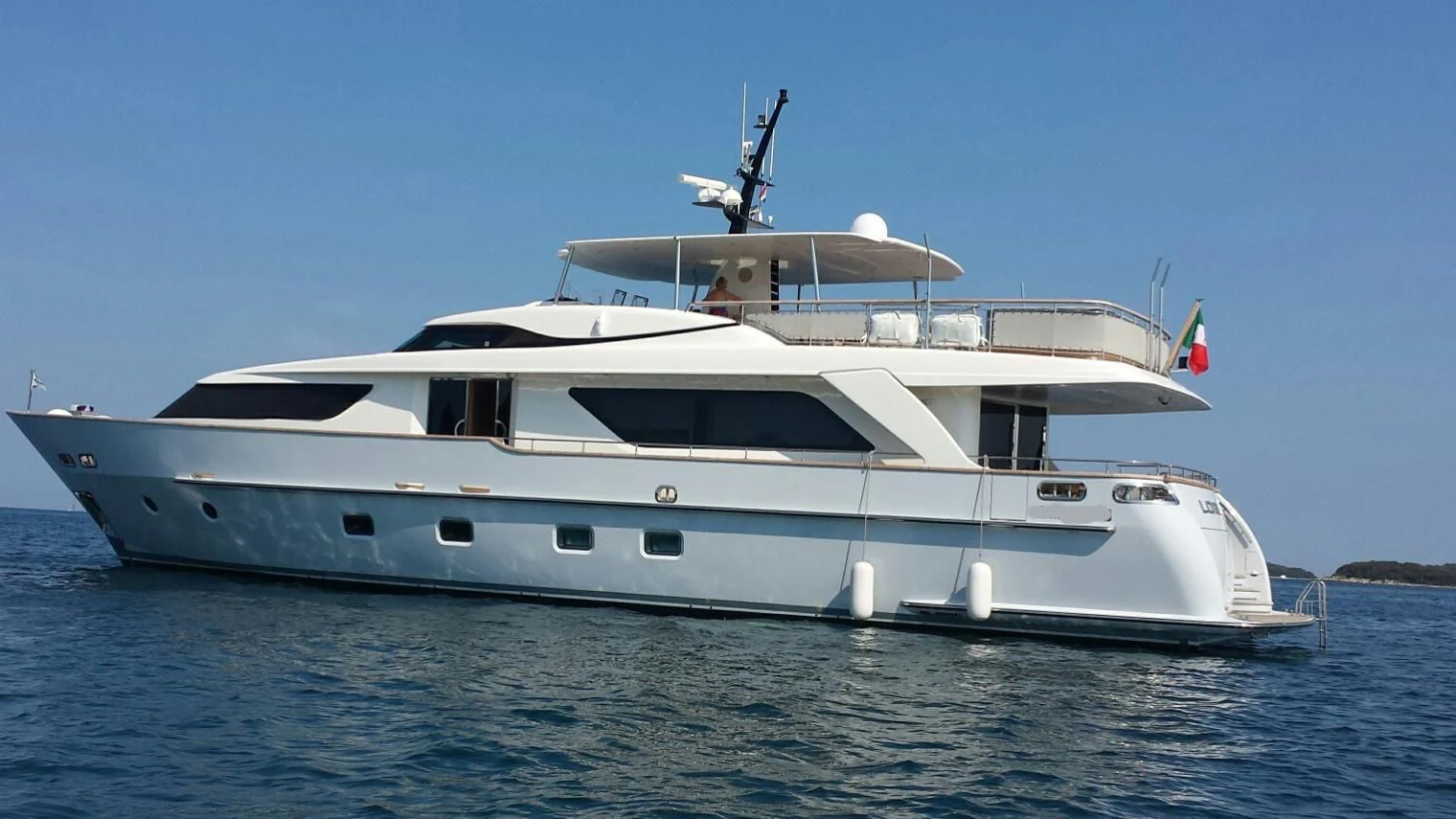 a white yacht on the water aboard ELYSIUM Yacht for Sale