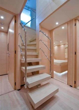 a staircase in a house aboard ELYSIUM Yacht for Sale