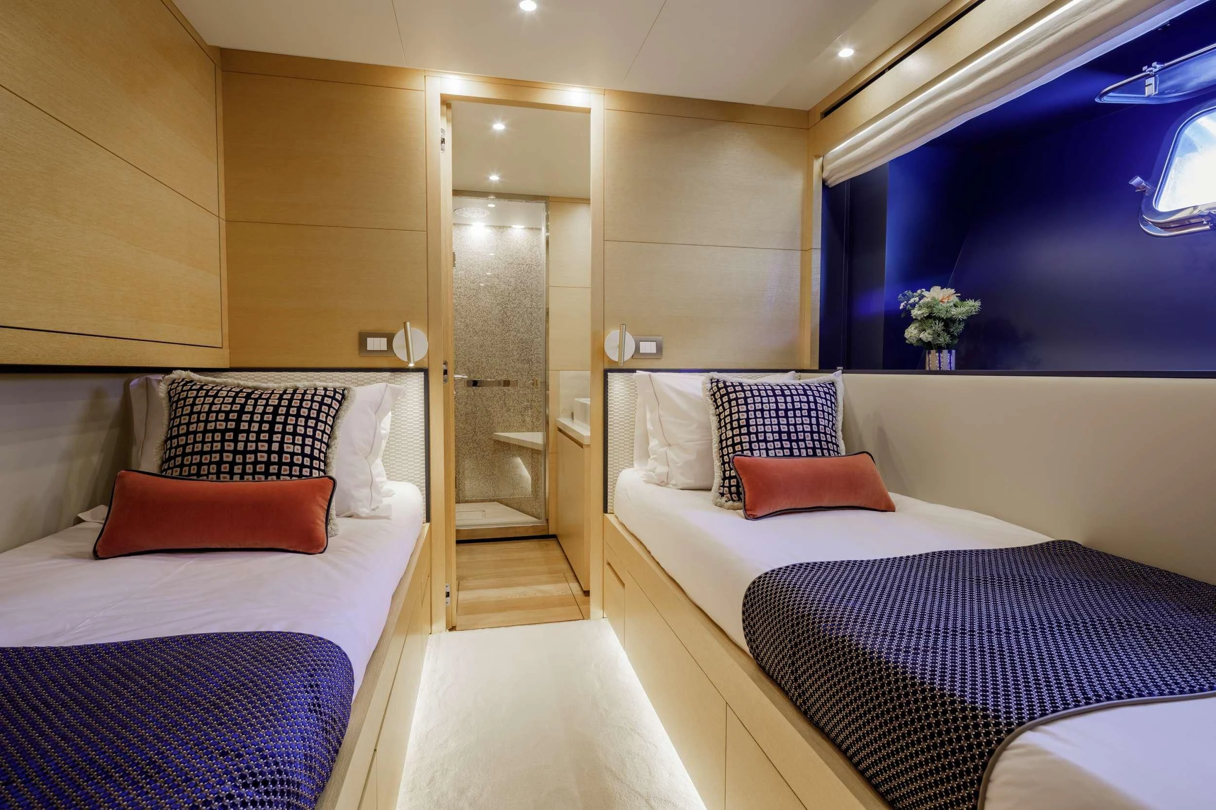 a room with two beds aboard ELYSIUM Yacht for Sale