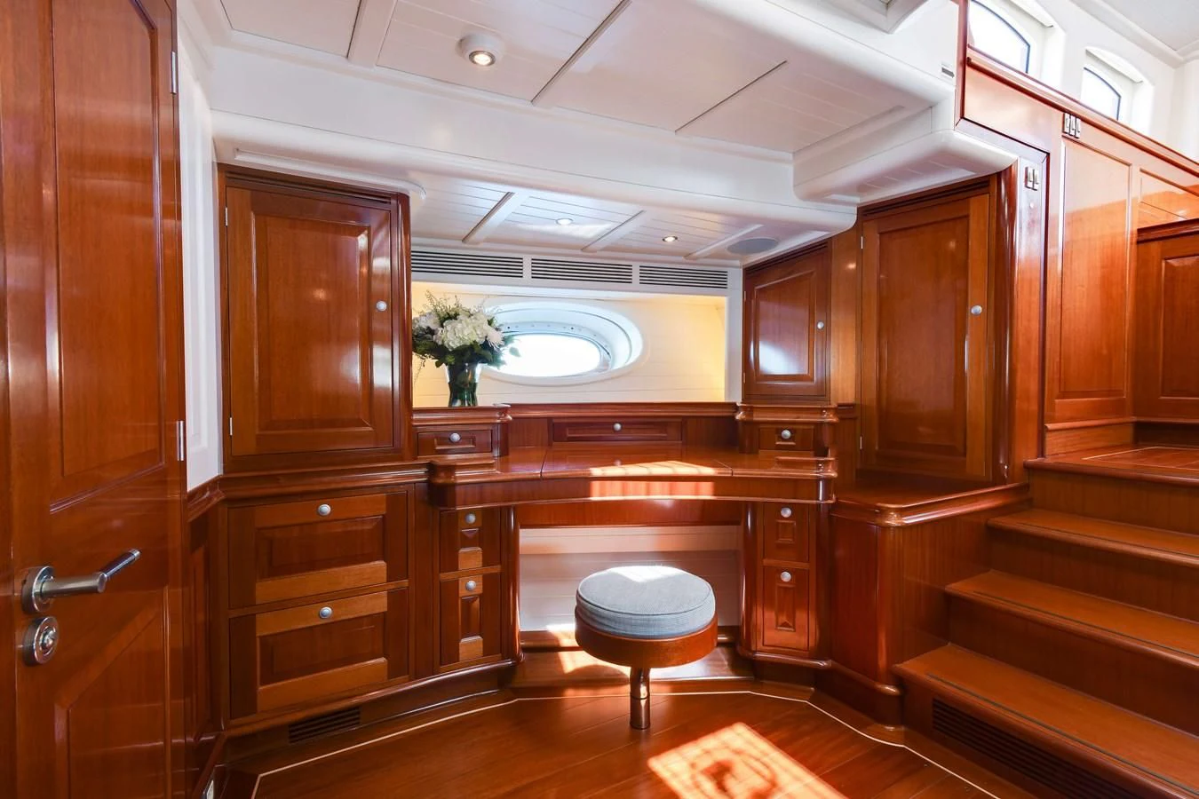 a room with wooden cabinets aboard ATALANTE Yacht for Sale