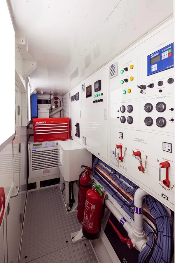 a white machine with buttons aboard ATALANTE Yacht for Sale