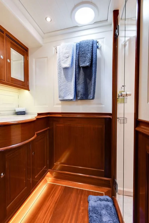 a bathroom with a towel on the wall aboard ATALANTE Yacht for Sale
