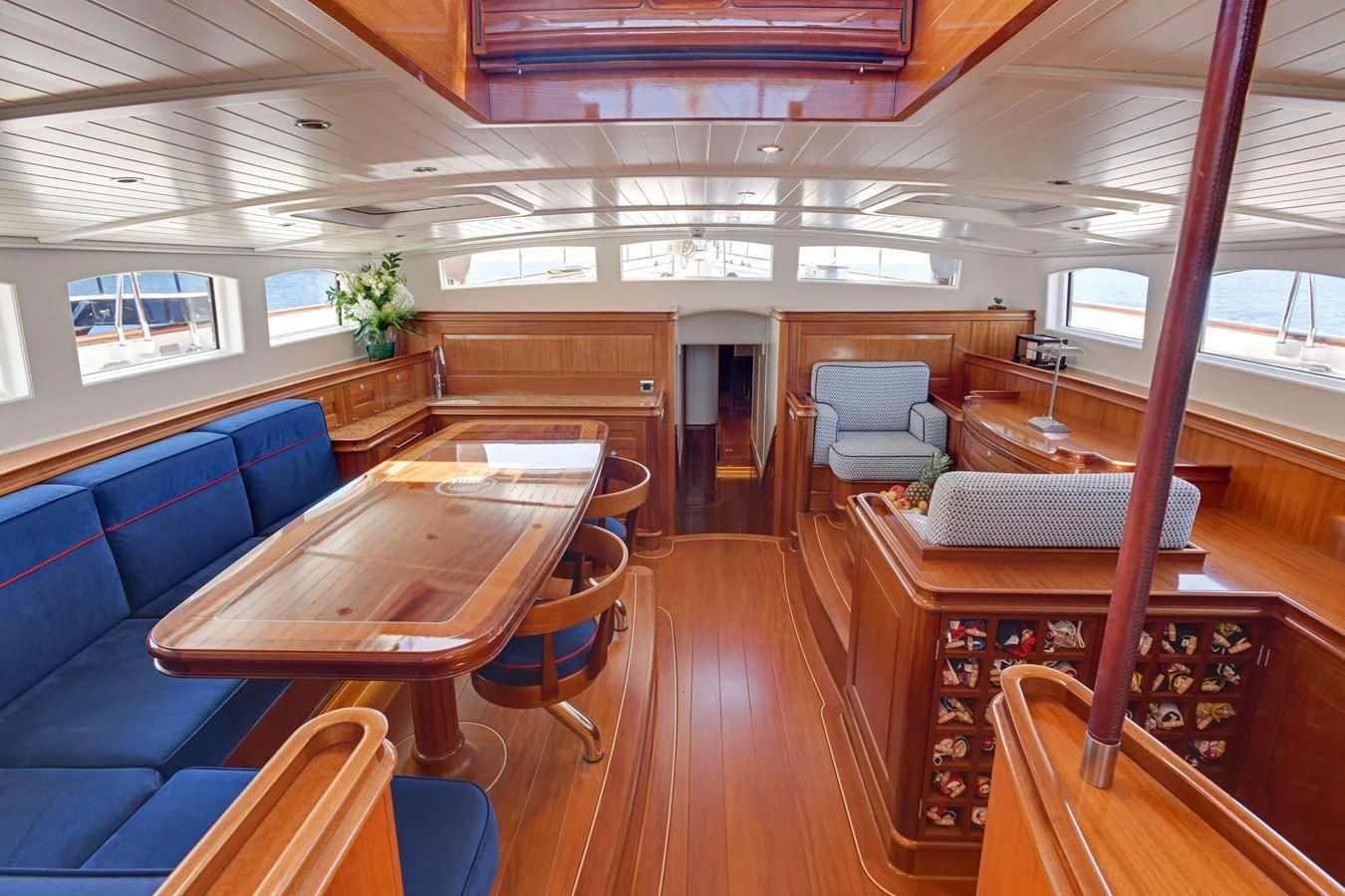 a room with tables and chairs aboard ATALANTE Yacht for Sale