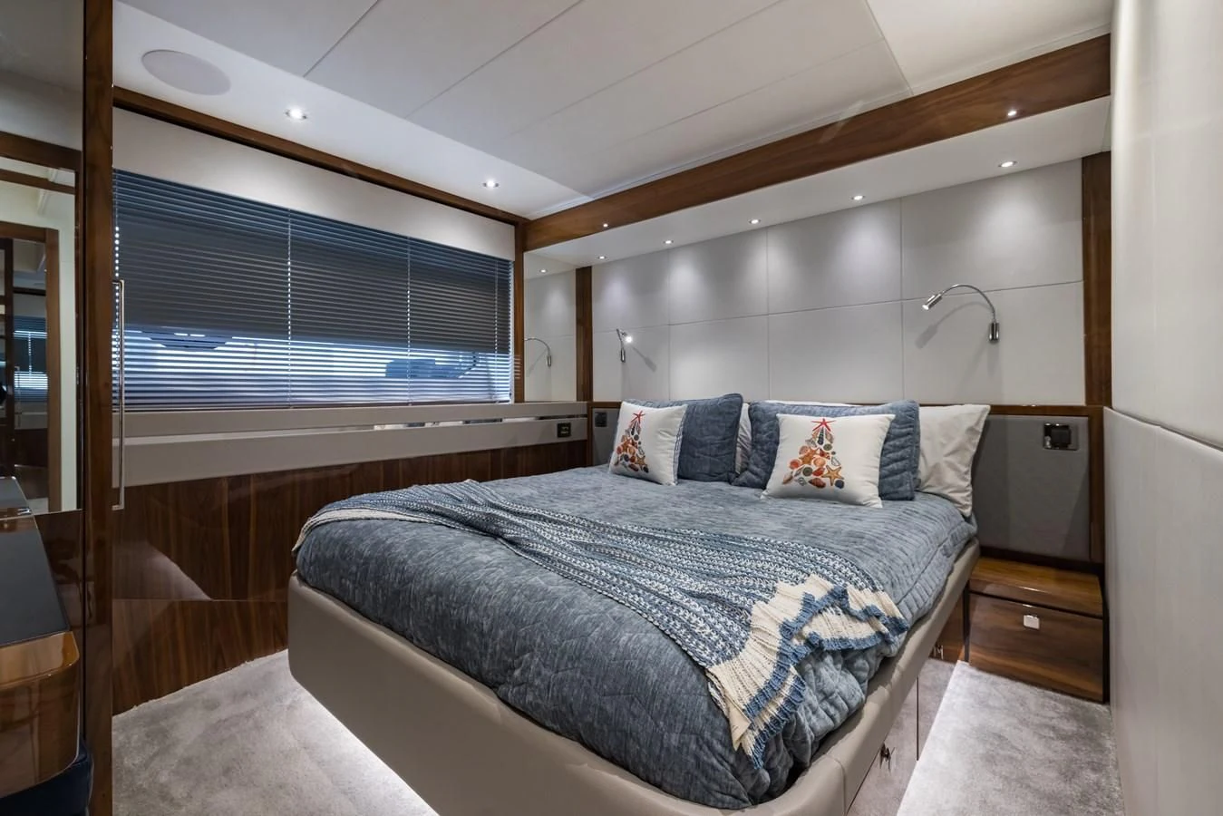 a bed in a room aboard MR. G Yacht for Sale