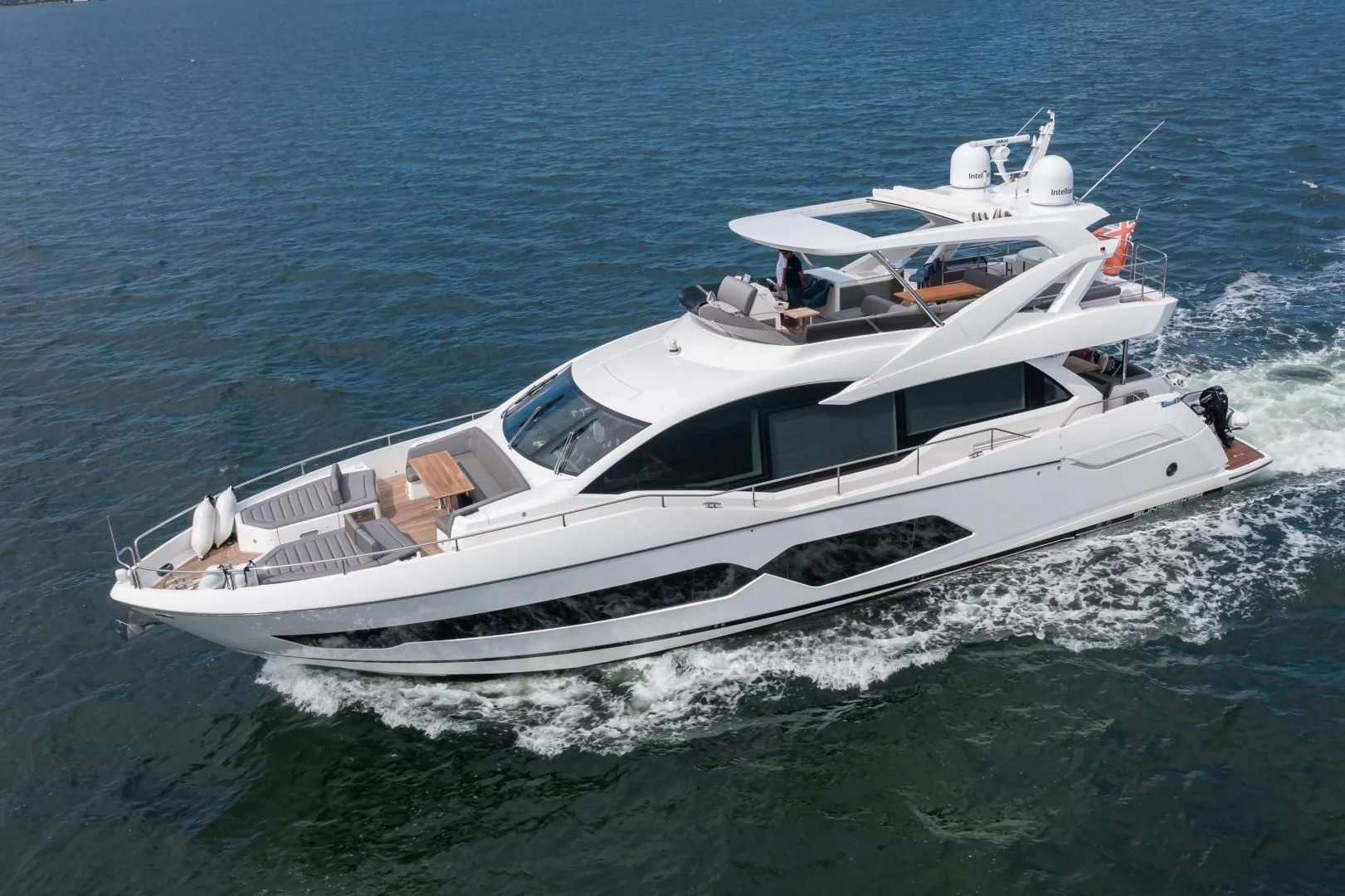 a white boat on the water aboard MR. G Yacht for Sale