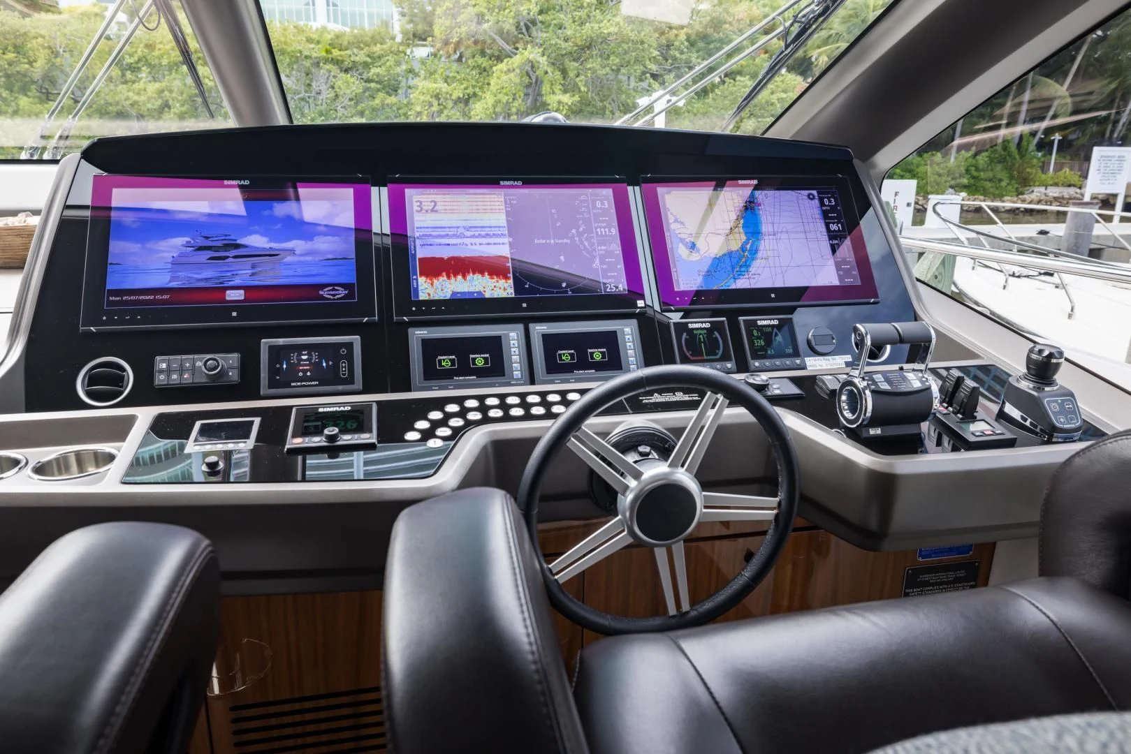 inside of a car aboard MR. G Yacht for Sale