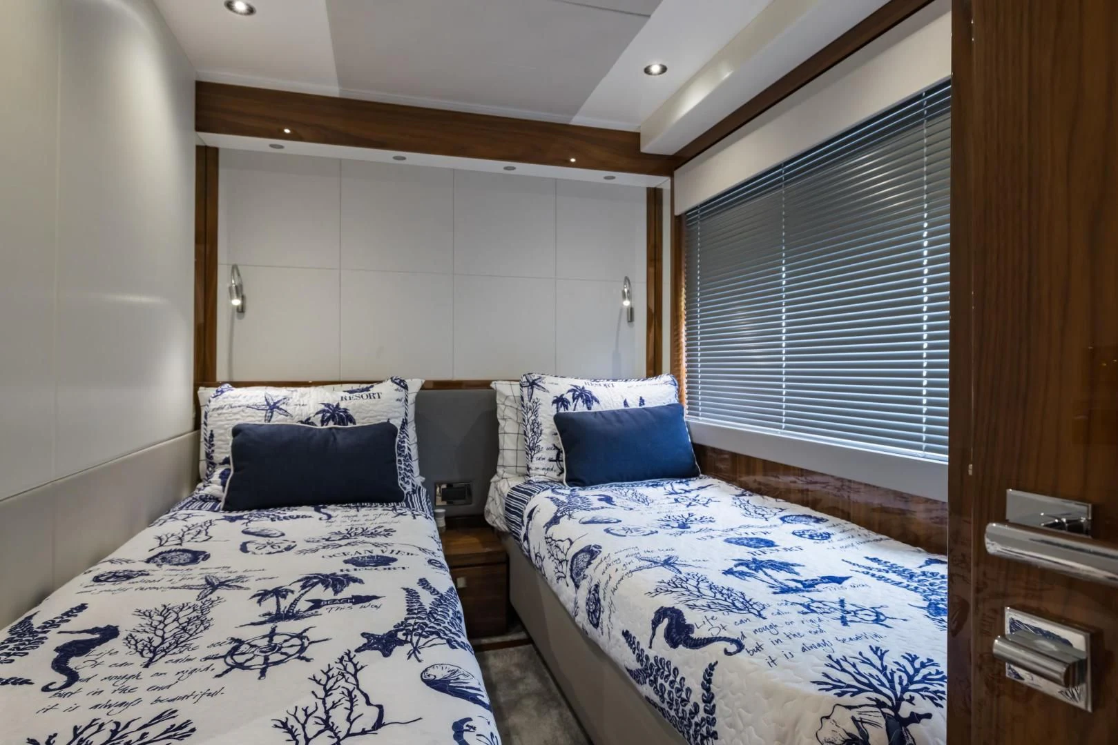 a couple of beds in a room aboard MR. G Yacht for Sale