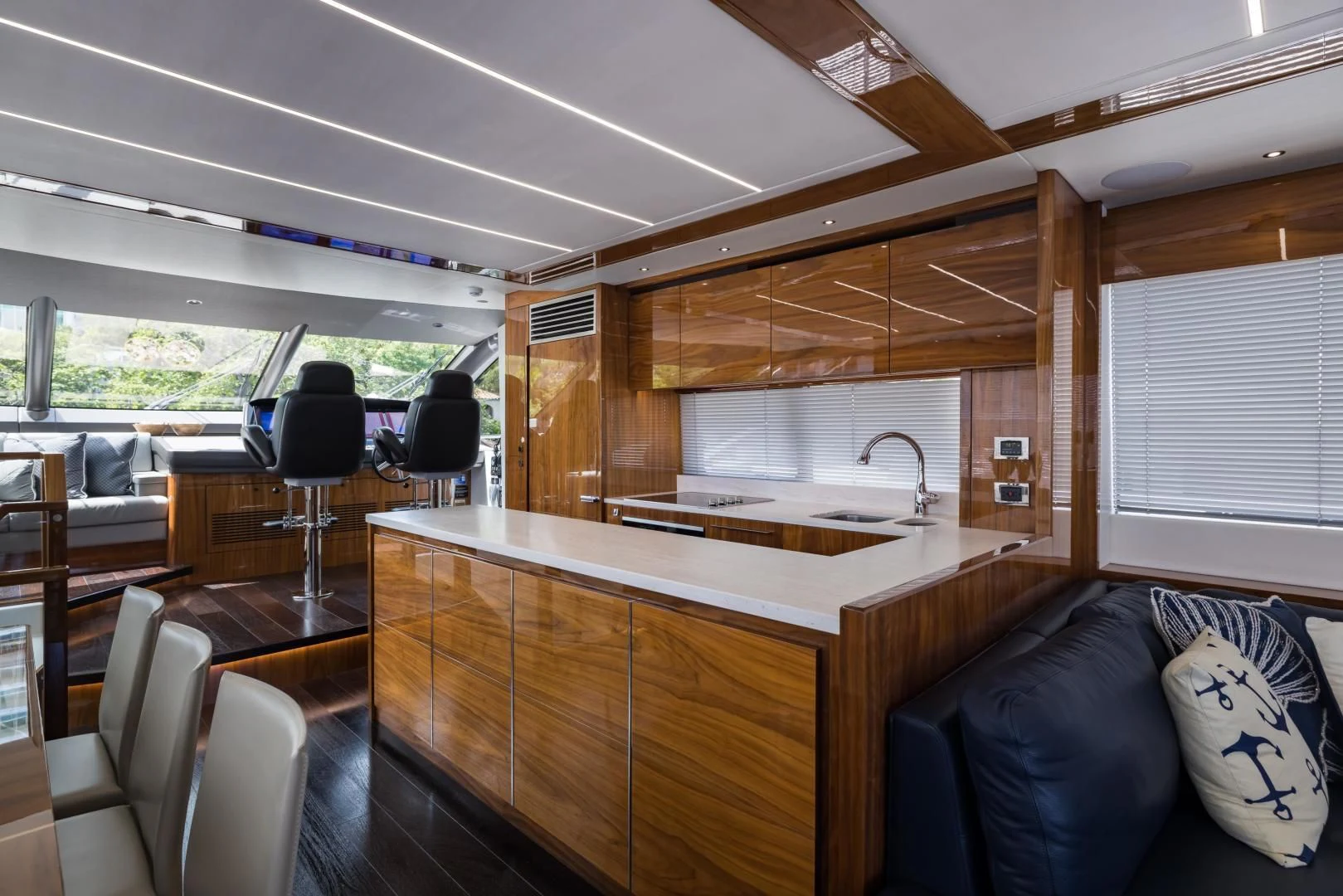 a kitchen with a large island aboard MR. G Yacht for Sale
