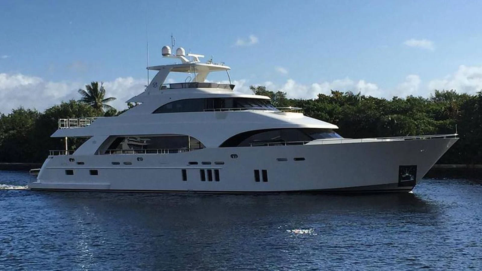 a white yacht on the water aboard MTL Yacht for Sale