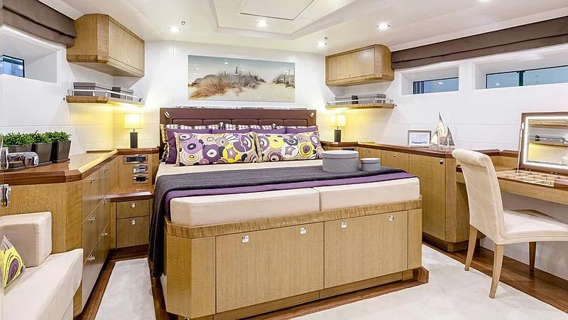 a kitchen with a bed and cabinets aboard BELLKARA Yacht for Charter
