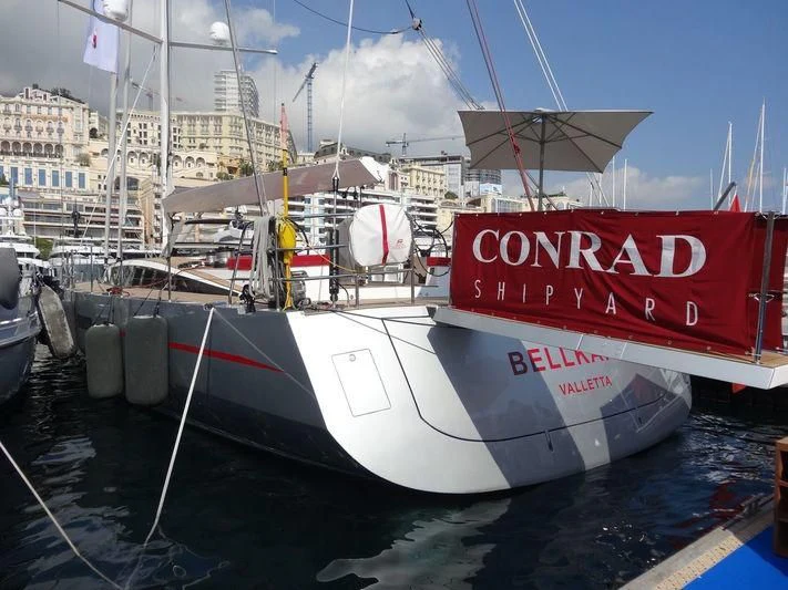 a large white boat in a harbor aboard BELLKARA Yacht for Charter