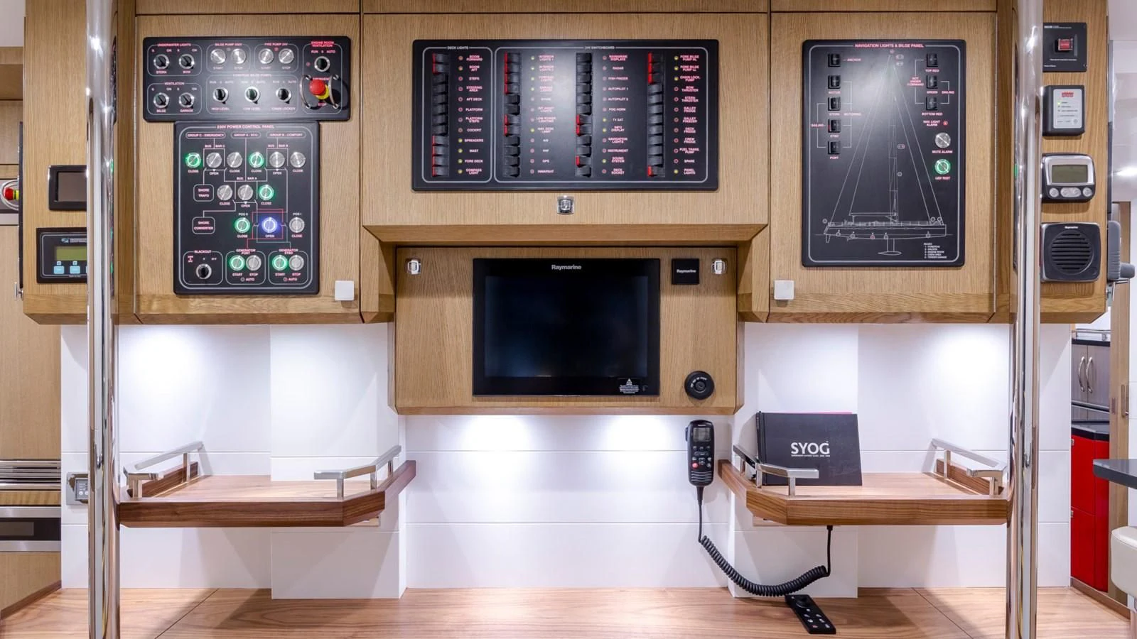 a room with a tv and a shelf with speakers aboard BELLKARA Yacht for Charter