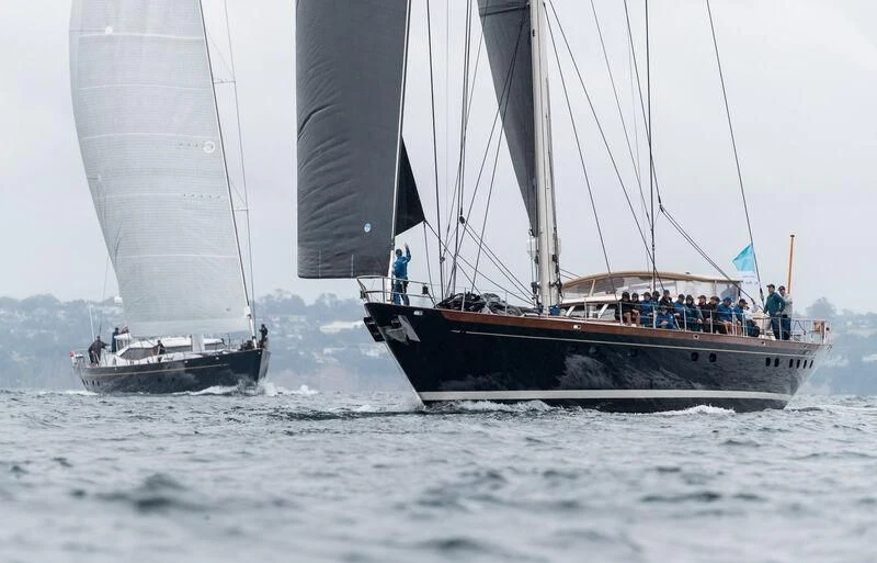 a sailboat with people on it aboard SASSAFRAS Yacht for Sale