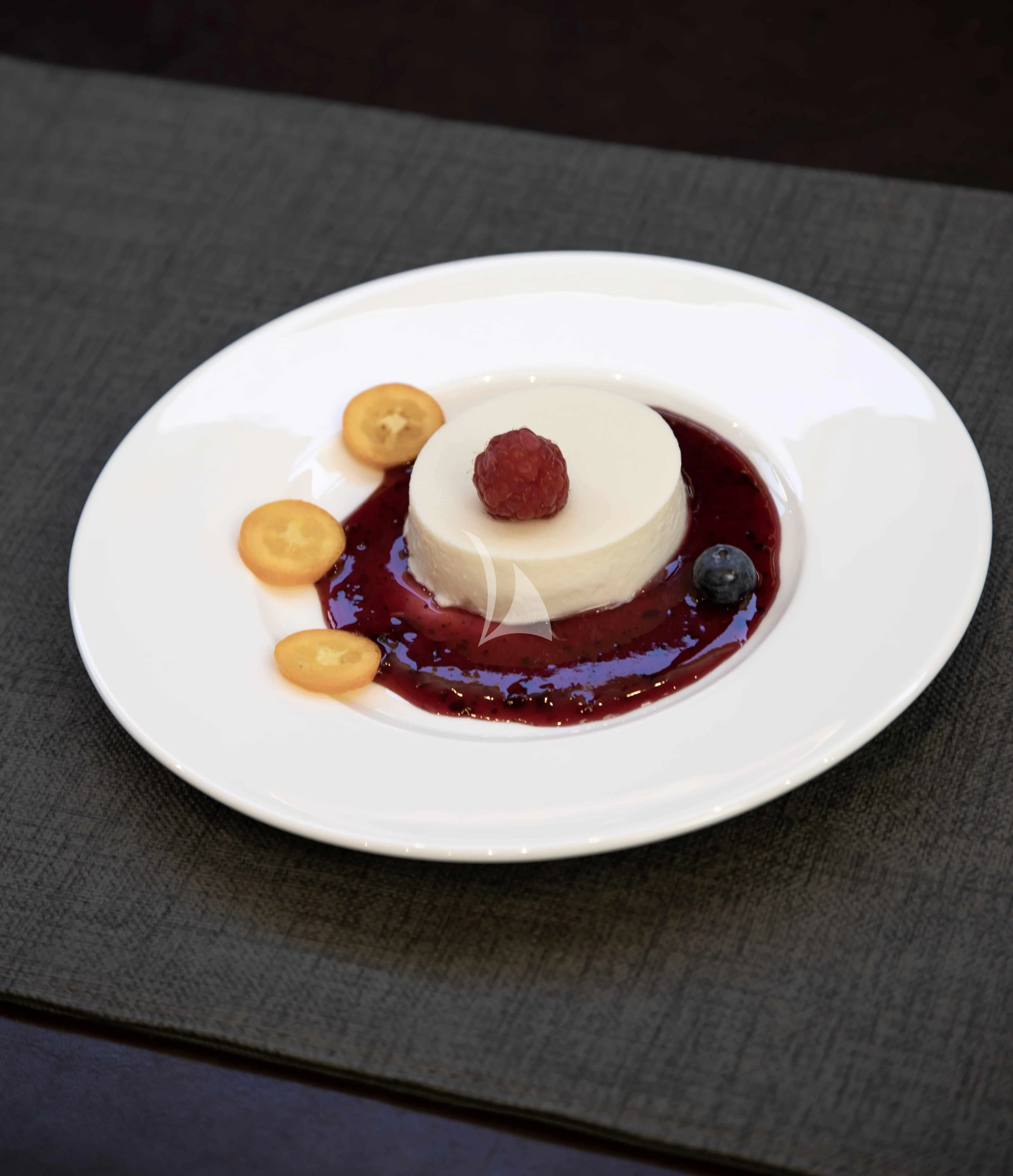 a plate with food on it aboard AMMONITE Yacht for Charter