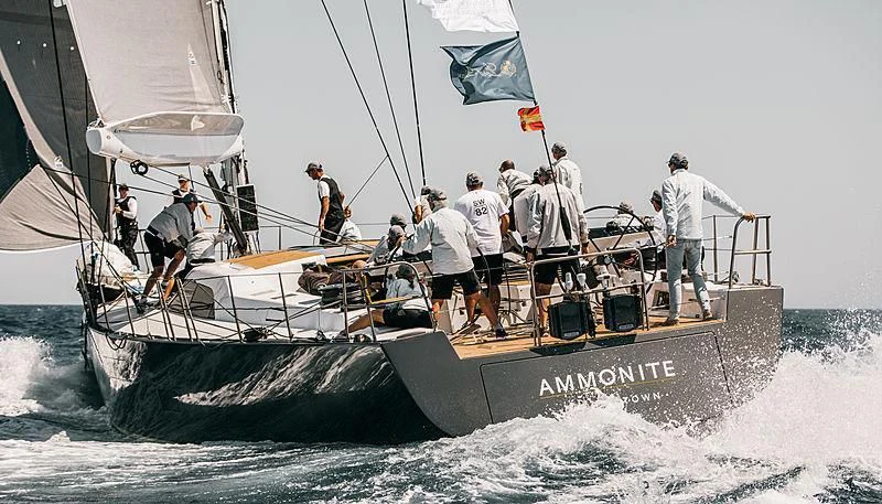 a group of people on a boat aboard AMMONITE Yacht for Charter