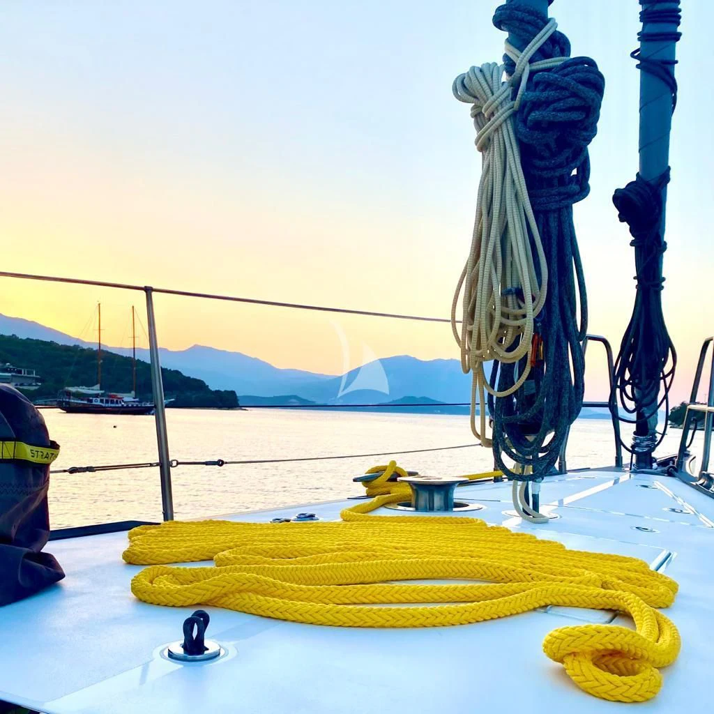 a banana and a glass bottle aboard AMMONITE Yacht for Charter