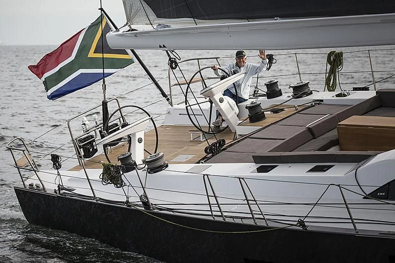 a person sailing on a boat aboard AMMONITE Yacht for Charter