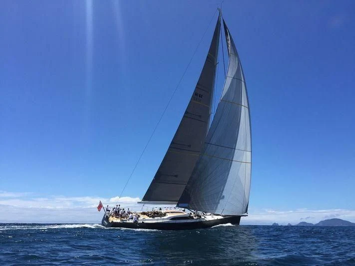 a sailboat in the ocean aboard AMMONITE Yacht for Charter