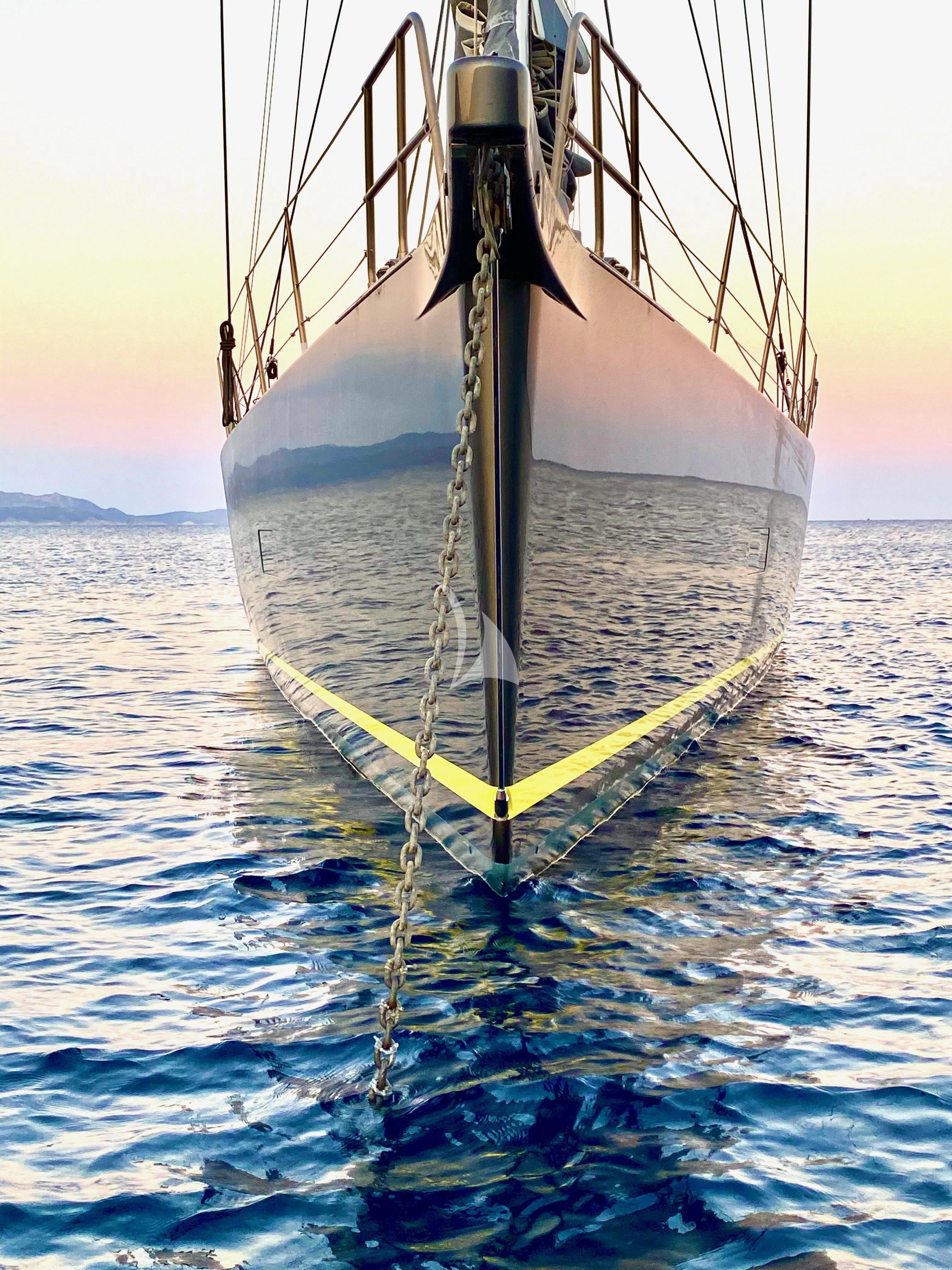 a sailboat in the water aboard AMMONITE Yacht for Charter
